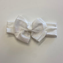 Load image into Gallery viewer, Baby Girl white stretchy bow hairband for Flowergirl or Christening or a special day.
