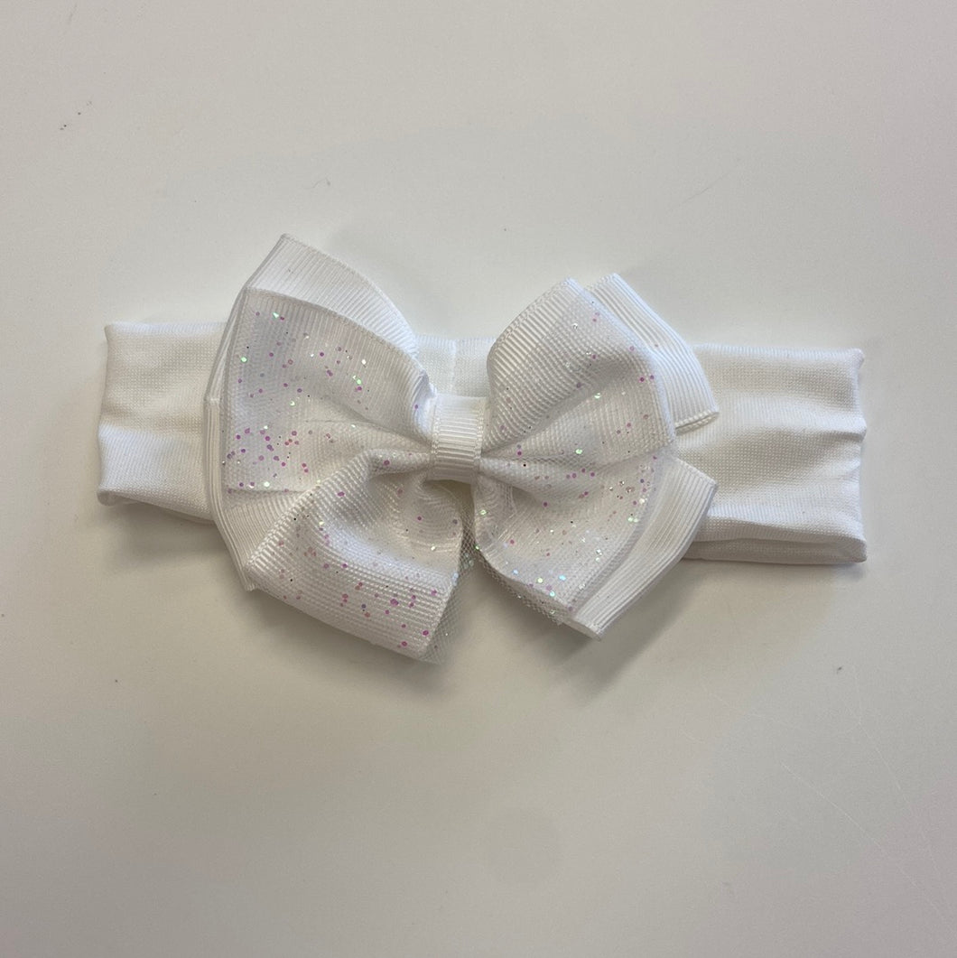 Baby Girl white stretchy bow hairband for Flowergirl or Christening or a special day.