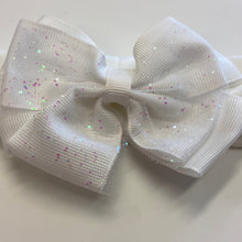 Load image into Gallery viewer, Baby Girl white stretchy bow hairband for Flowergirl or Christening or a special day.
